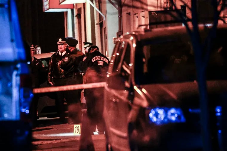 Philadelphia police on the scene in the 1900 block of South Bancroft Street where an officer fatally shot a man. Tuesday, Jan. 4, 2022.