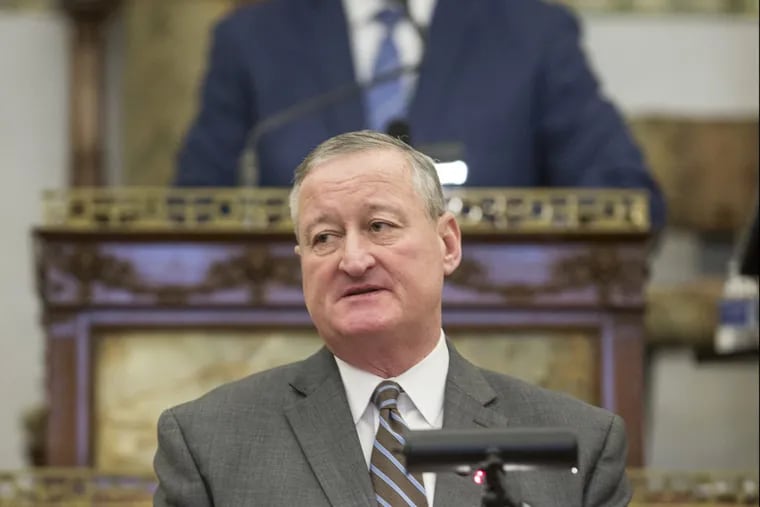 Philadelphia Mayor Kenney, with City Council President Darrell L. Clarke standing behind him, gives his third budget address to City Council on Thursday, March 1, 2018.