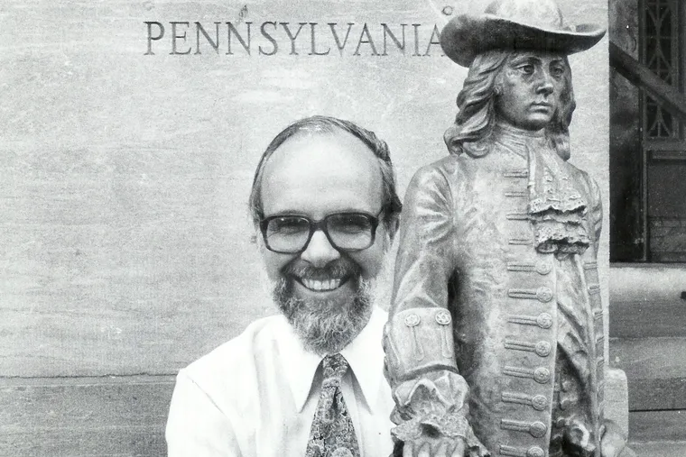 A native of Minnesota, Professor Dunn, here with a statue of William Penn, became an expert on his adopted hometown of Philadelphia.