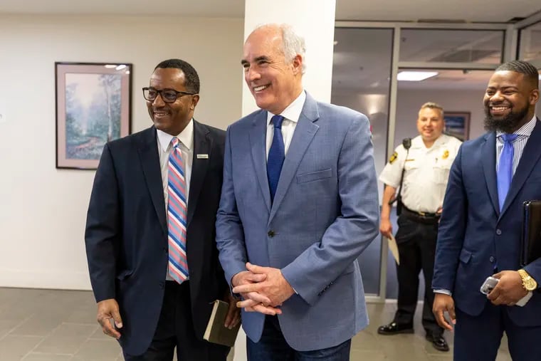 Sen. Bob Casey (D., Pa.) meets with Chester Mayor Stefan Roots in Chester, Pa., on April 2, 2024. Casey is seeking a fourth term in the U.S. Senate.