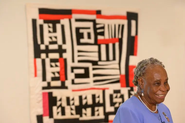 Artist Mary Lee Bendolph talks about her work in front of her quilt "Blocks, Strips, Strings, and Half Squares" during a press conference announcing the opening of "Souls Grown Deep: Artists of the African American South" exhibit at the Perelman Building of the Philadelphia Museum of Art on June 5.