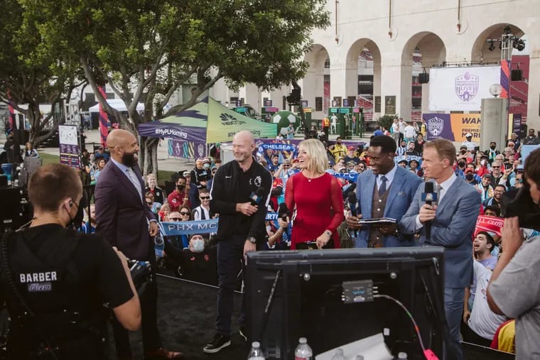 NBC Sports' Premier League studio team at the Los Angeles fan festival in October 2021. From left to right: Tim Howard, special guest Alan Shearer, host Rebecca Lowe, Robbie Earle, and Robbie Mustoe.