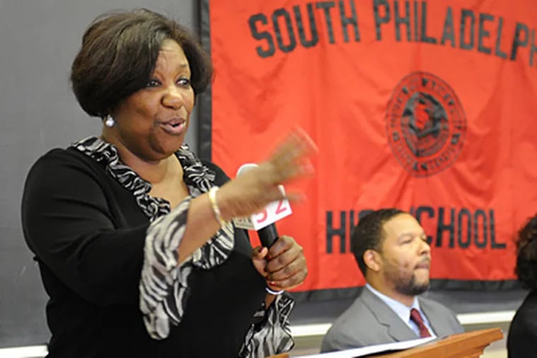 In this August photo, schools superintendent Arlene Ackerman addresses the small assembly of new students at South Philadelphia High School as principal Otis Hackney  listens. (Clem Murray / File)