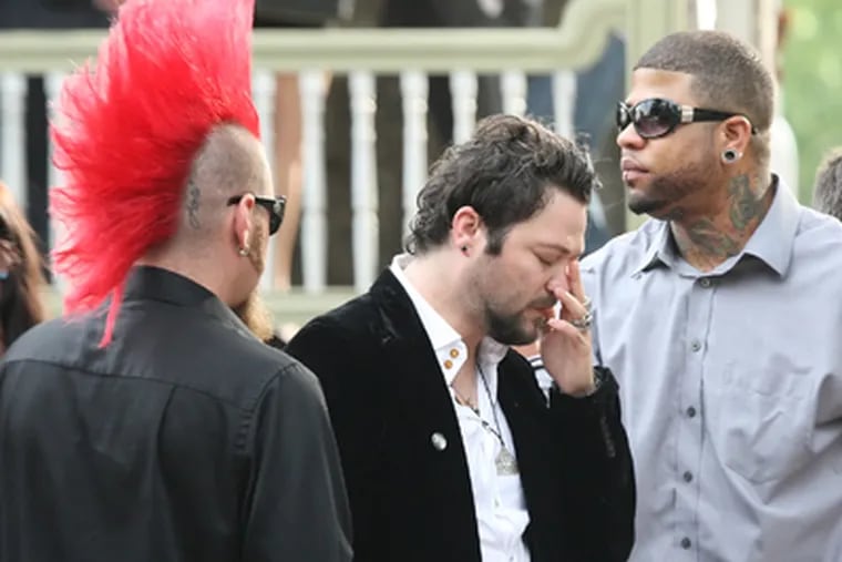 Brandon "Bam" Margera (center), Ryan Dunn's "Jackass" costar, after a viewing at the DellaVecchia, Reilly, Smith & Boyd Funeral Home in West Chester. (Steven M. Falk / Staff Photographer)