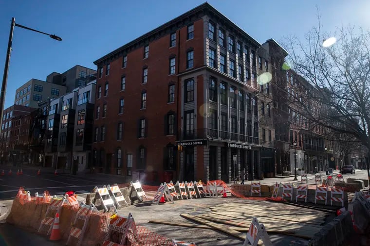 Barricades block the intersection at Third and Arch streets in the Old City neighborhood in Philadelphia, Pa., on Tuesday, January 21, 2020. A water main break on January 7 has had continued effects for businesses in the area, as the intersection is still closed to vehicle traffic.