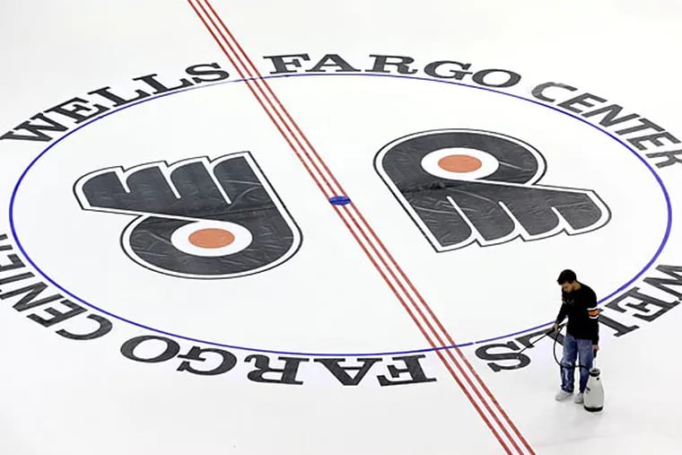 Ed Snider's distinct double logo look at center ice will make its triumphant return this season.