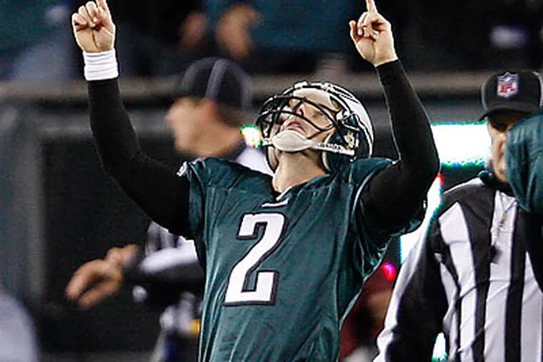 David Akers celebrated after kicking the game-winning winning field goal from 28 yards with seven seconds left. (David Maialetti/Staff Photographer)