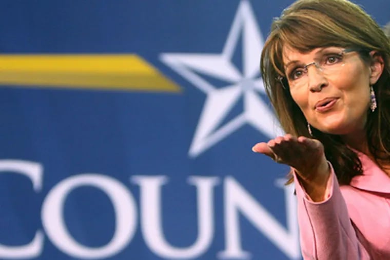 A day after abruptly announcing she would soon give up her job as governor, Palin on Saturday indicated on a social networking site that she would take on a larger, national role, citing a "higher calling" to unite the country along conservative lines. (AP Photo/Joe Burbank, Pool, File)