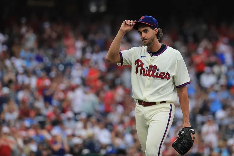 Philadelphia Phillies starting pitcher Aaron Nola tips his cap as he exits in the eighth inning as the Phillies beat the New York Yankees, 7-0,  at Citizens Bank Park on June 13, 2021.