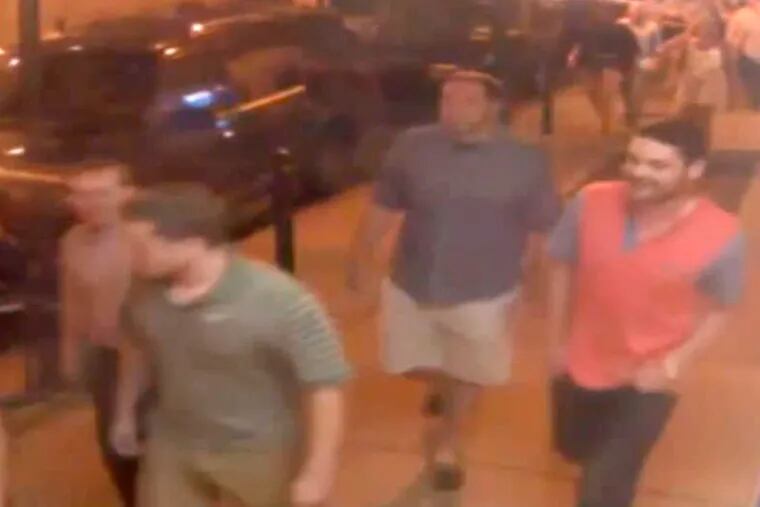 A screenshot from surveillance video that Philadelphia police posted in the search for 'persons of interest' in an alleged attack on two gay men.