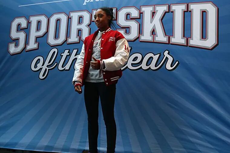 Mo'ne Davis speaks to the crowd as she was named the Sports Illustrated SportsKid of the Year at Lincoln Financial Field. (David Maialetti/Staff Photographer)
