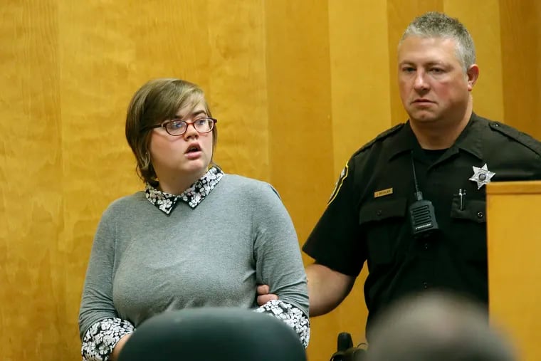 FILE - In this Sept. 29, 2017, file photo, Morgan Geyser, one of two Wisconsin girls charged with stabbing a classmate 19 times in 2014 to impress the fictitious horror character Slender Man, enters a Waukesha County Court for a status hearing in Waukesha, Wis. Geyser is appealing her case. The Journal Sentinel reports that Morgan Geyser's attorney recently filed a court brief arguing that Geyser shouldn't have been prosecuted as an adult because the girl believed Slender Man would kill her family if she didn't stab her sixth-grade classmate. (Michael Sears/Milwaukee Journal-Sentinel via AP, Pool, File)