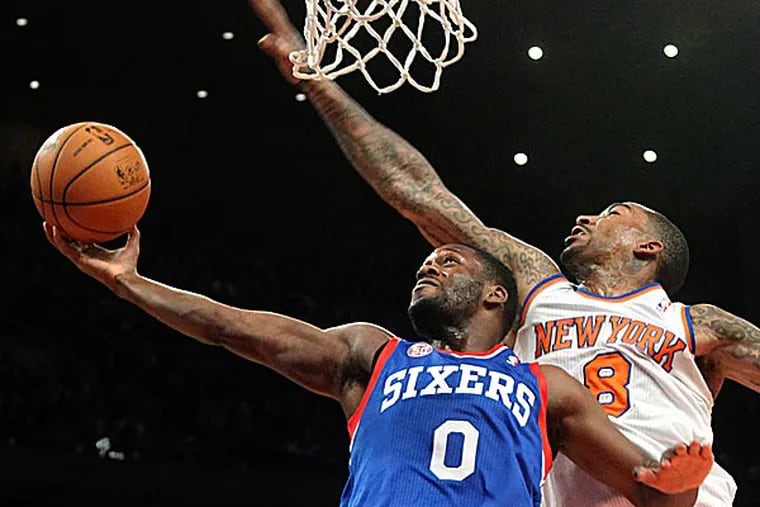 The 76ers' Jeremy Pargo shoots past Knicks' J.R. Smith during the second half. (Mary Altaffer/AP)