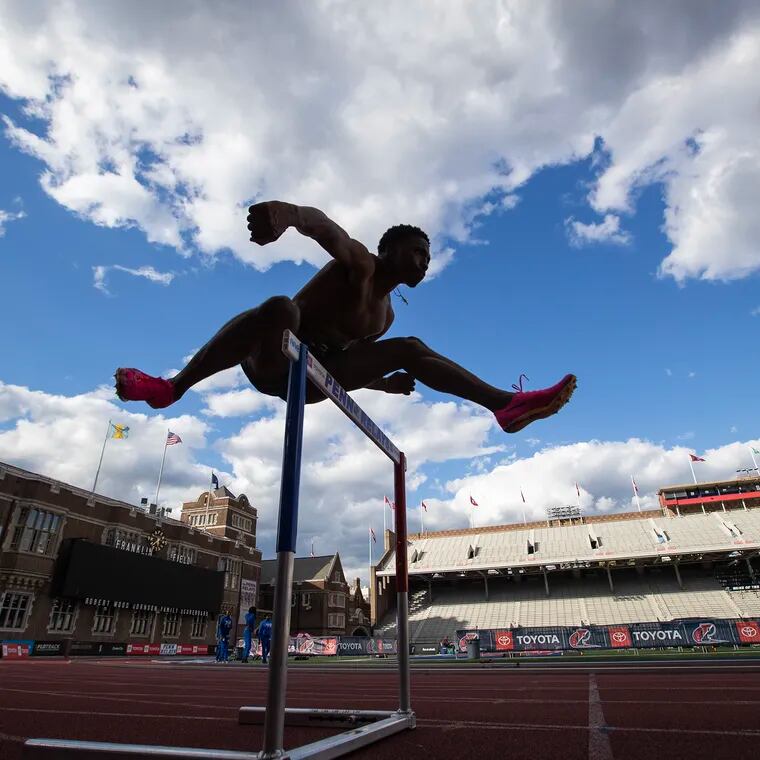 Shane Gardner, a sophomore at Penn, gets in some extra practice on the eve of the Penn Relay Carnival on April 24, 2024.  He will compete in the 110m high hurdles and the 4x100m relay in the Penn Relays.