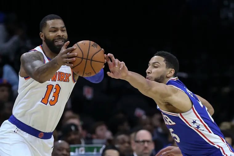 Ben Simmons (right) had a strong all-around game against the Knicks.