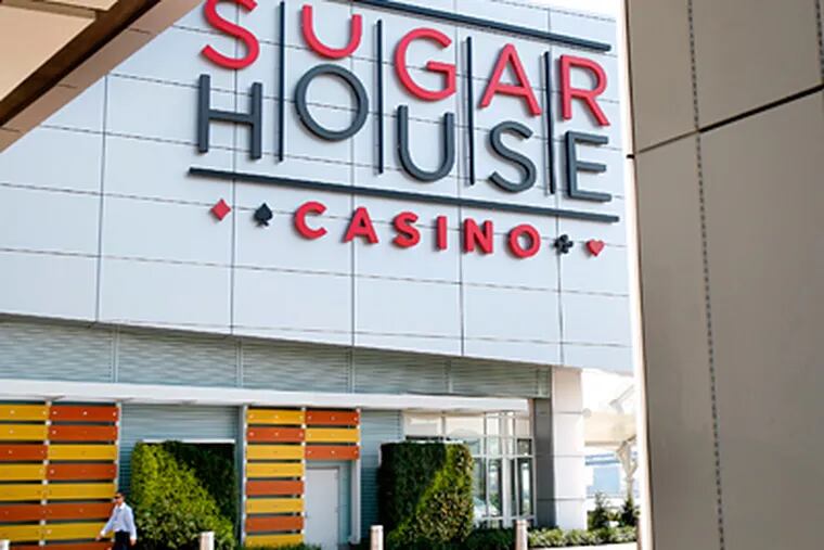 Guests arrive at SugarHouse Casino. It also plans to link its site to Penn Treaty Park by extending a waterfront trail. (Tom Gralish / Staff Photographer)