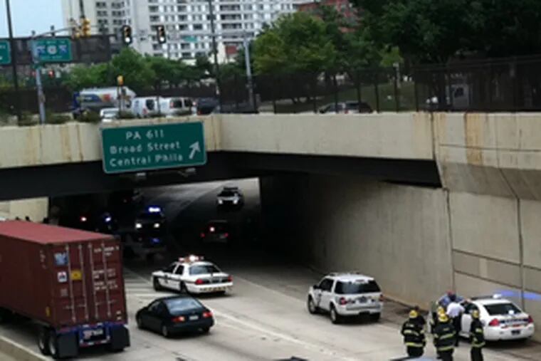 A suspicious package found on the westbound Vine Street Expressway brought police and fire department personnel to the scene midday on Aug. 9, 2011. The package was not a bomb.