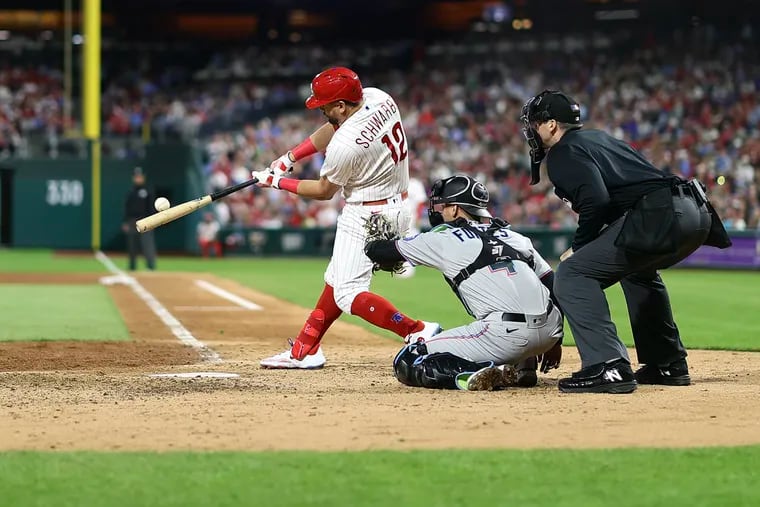 Philadelphia Phillies designated hitter Kyle Schwarber connects for his third home run of the season during Tuesday’s 8-4 loss to the Miami Marlins. The Phillies and Marlins have combined for 30 runs during the first two games of a series that concludes Wednesday. (Photo by Tim Nwachukwu/Getty Images)