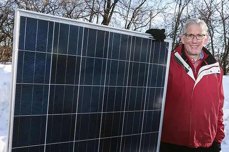 Jim Innes, of CarrierClass Green Infrastructure. The company has developed solar-powered charging stations which can be combined to form a micro grid and backup power source during extended power outages.  (  Steven M. Falk / Staff Photographer )