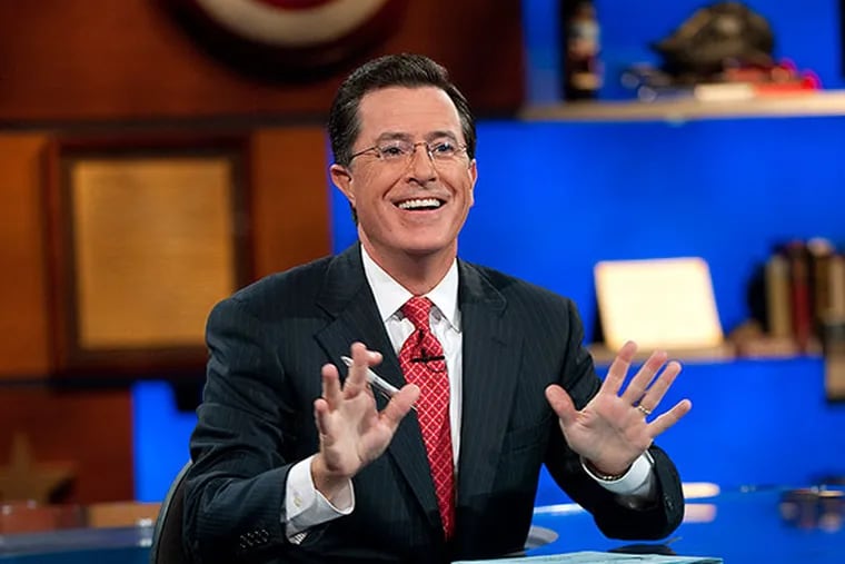 Stephen Colbert appears during  " The Colbert Report," in New York. (AP Photo/Comedy Central, Scott Gries)