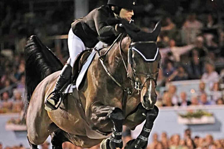 Jessica Springsteen finished fifth at the Grand Prix of the Devon Horse Show Thursday. MICHAEL BRYANT / Staff
