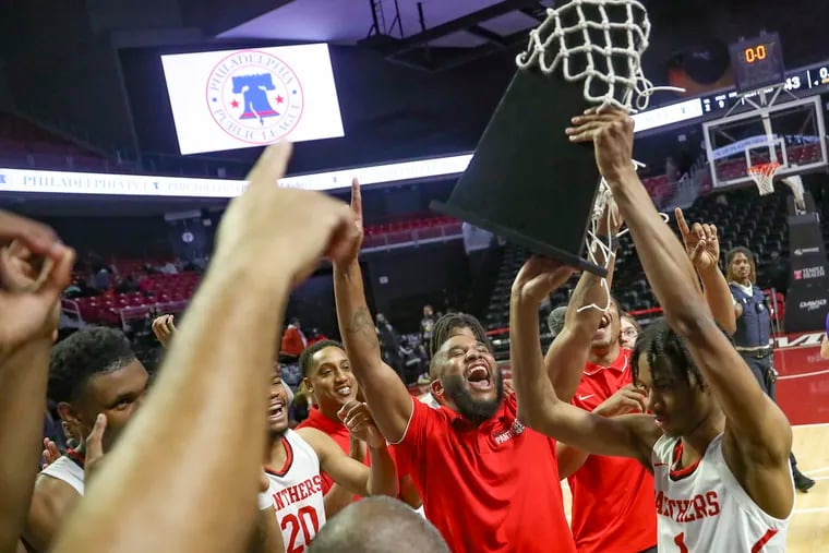 Imhotep celebrates its Public League championship after beating West Philadelphia on Saturday at the Liacouras Center.