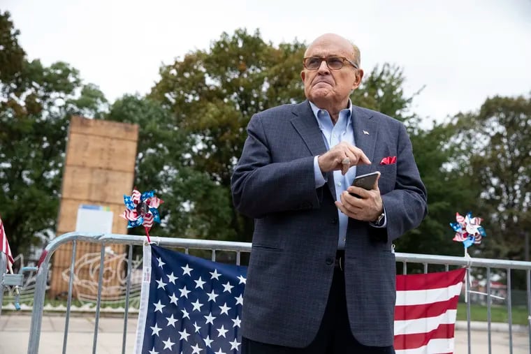 Former New York City Mayor Rudy Giuliani made a visit to the boxed Columbus statue at Marconi Plaza in Philadelphia on Oct. 12.
