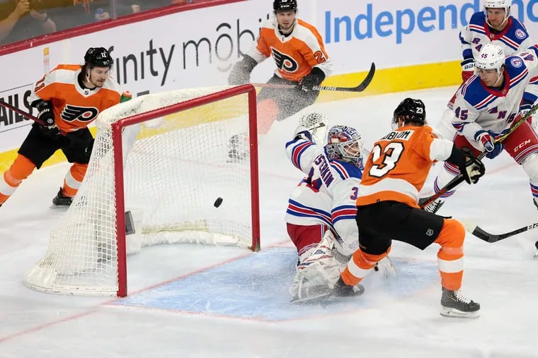 Flyers #23 Oskar Lindblom deflects the puck past Rangers goalie #31 Igor Shesterkin, knotting the game 1-1, with 8:15 to go in the first period of the New York Rangers at Philadelphia Flyers NHL game at the Wells Fargo Center in Phila., Pa. on Jan. 15, 2022.