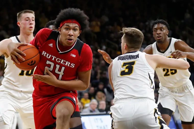 Rutgers forward Ron Harper Jr. taking the ball to the basket against Iowa last season. The Scarlet Knights need a couple of more wins to assure themselves of at least an at-large bid to their first NCAA Tournament in nearly three decades.