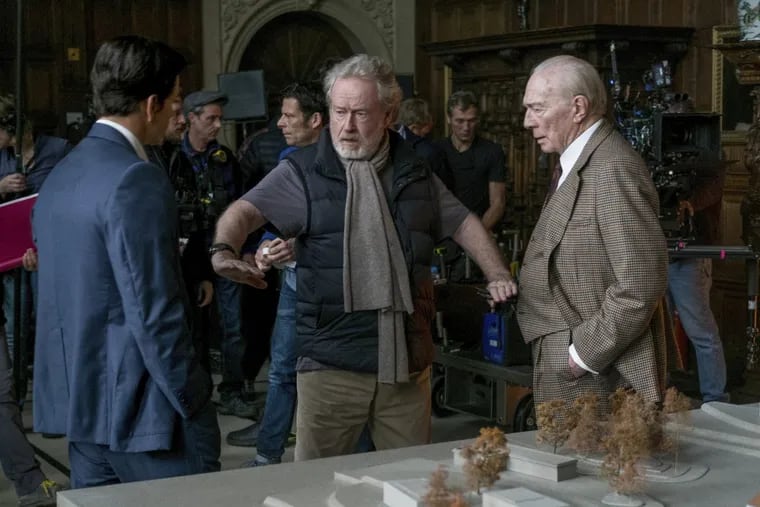 Actors Mark Wahlberg, left, and Christopher Plummer, right, listening to director Ridley Scott on the set of TriStar Pictures' &quot;All The Money In The World.&quot; Scott says he hasn't heard from Kevin Spacey since the decision was made to cut the actor from the film.