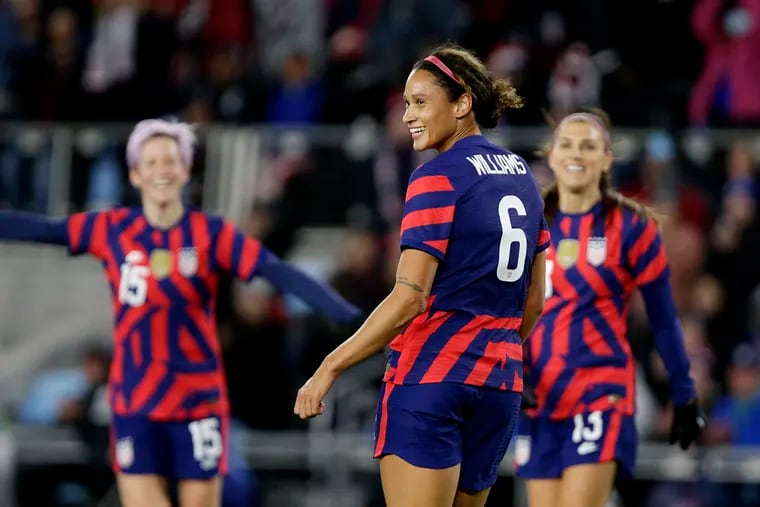 Lynn Williams (center) is back with the U.S. women's soccer team after a long injury absence.