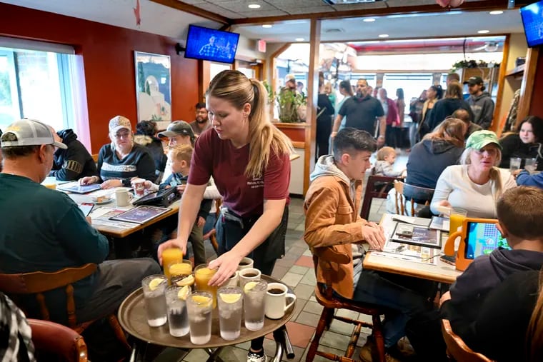 Waitress Rachel Gurcik serves customers at the Gateway Diner in Westville, Pa., last year.