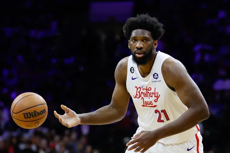 Sixers center Joel Embiid passes the basketball against the Chicago Bulls on Monday, March 20, 2023 in Philadelphia.