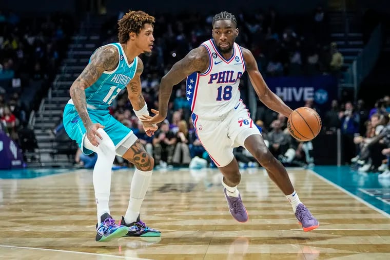 76ers guard Shake Milton drives around Charlotte Hornets guard Kelly Oubre Jr. during the second half on Wednesday. The Sixers dropped to .500 on the season after the 107-101 loss.