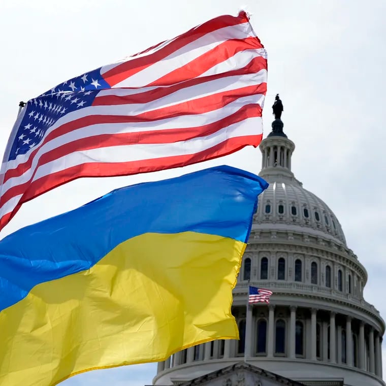 The American and Ukrainian flags wave outside of the U.S. Capitol on Tuesday in Washington. Partisan politics got in the way of aiding Ukraine, writes the Editorial Board, hurting gains Kyiv had made against its Russian invaders.