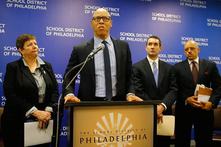 Philadelphia schools Superintendent William R. Hite Jr. (center) is flanked by Marjorie Neff (left), chairman of the School Reform Commission, Auditor General Eugene DePasquale (second from right) and state Sen. Vincent Hughes to announce the findings of the report.