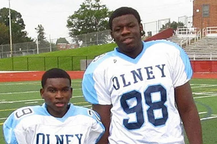 Martin Luther King offensive lineman Dontae Angus (right) began his career at Olney.