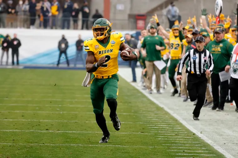 North Dakota State quarterback Quincy Patterson runs a keeper for long yardage against Montana State during the FCS Championship game.