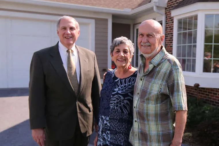 John Diffey, CEO of Kendal Corp., a Kennett Square continuing-care retirement community, with Angela and Luke Hyman at their home.