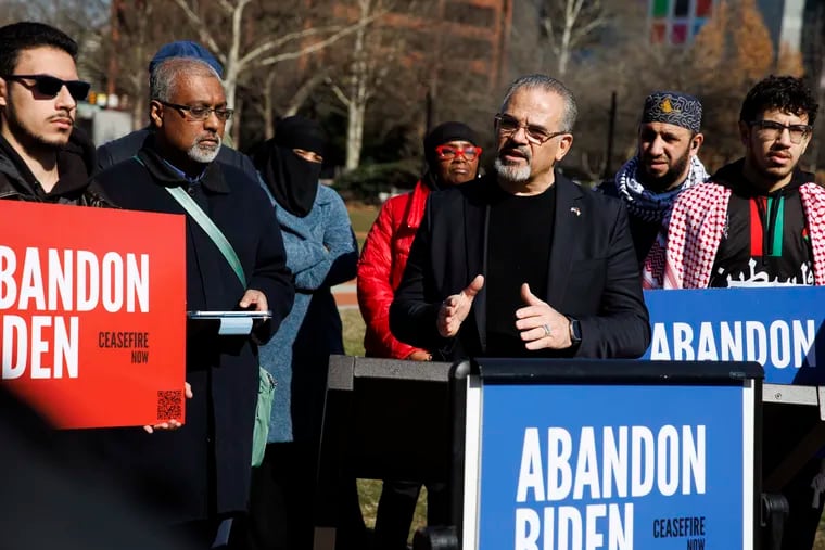 Khalid Turaani, a co-founder of the "Abandon Biden" movement, speaks during a rally Monday at Independence Mall. The group seeks to persuade Muslim voters to oppose Biden's reelection based on his support for Israel.