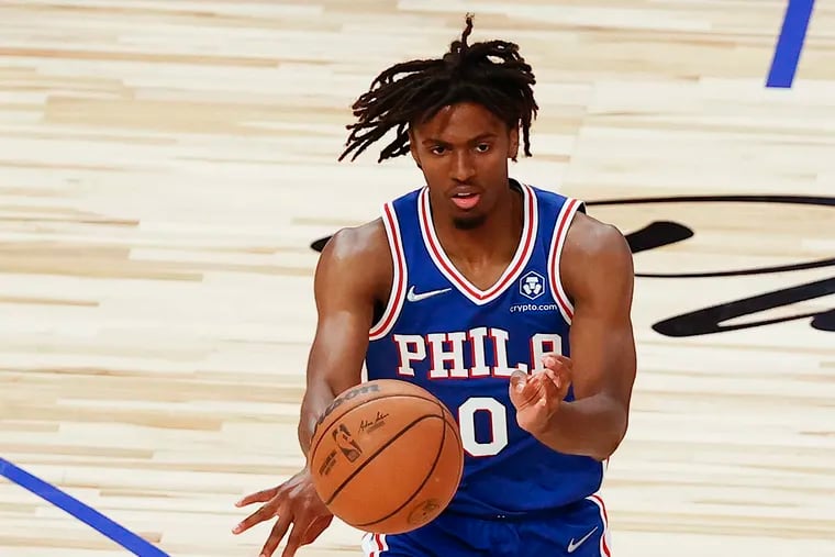 Sixers guard Tyrese Maxey passes the basketball against the Detroit Pistons during a preseason game last week.