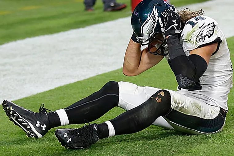 Eagles' Riley Cooper sits in the end zone after the Eagles lost to the
Arizona Cardinals. (Yong Kim/Staff Photographer)