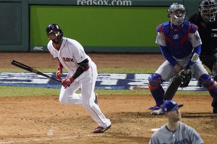 Boston's Eduardo Nunez watches his three-run home run off Los Angeles relief pitcher Alex Wood during the seventh inning of Game 1 of the World Series on Tuesday.