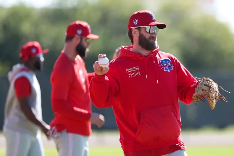 Bryce Harper has been dealing with back stiffness, but the Phillies are confident that he will be ready for opening day.