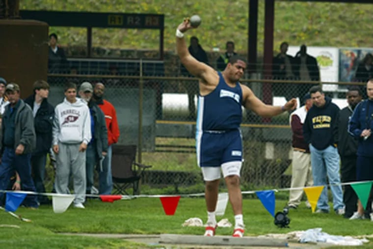 Second-place finisher Wayne Crawford, of Chestnut Hill Academy, uncorks shot put at Franklin Field.