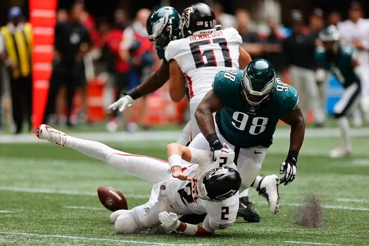 Eagles defensive tackle Hassan Ridgeway forces a grounding penalty on Atlanta Falcons quarterback Matt Ryan.
