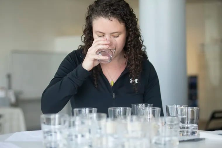 Beth MacKenzie, water sommelier and certified brew master, participates in a water taste test at the Philadelphia Inquirer building on May 21, 2019.