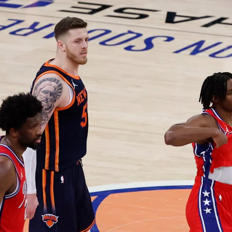 Sixers guard Tyrese Maxey and center Joel Embiid react after losing game 2 of the first round NBA Eastern Conference playoffs past Knicks center Isaiah Hartenstein.