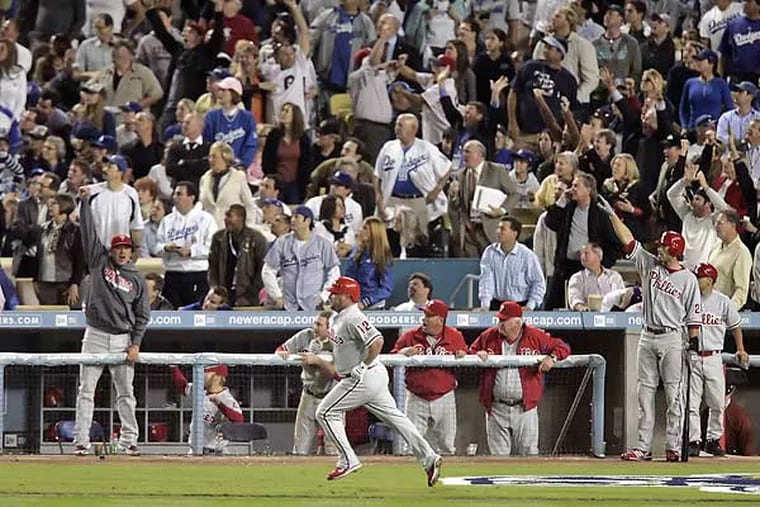 The Phillies bench reacts to Matt Stairs' go-ahead home run in the 8th inning of Game 4 of the 2008 NLCS.