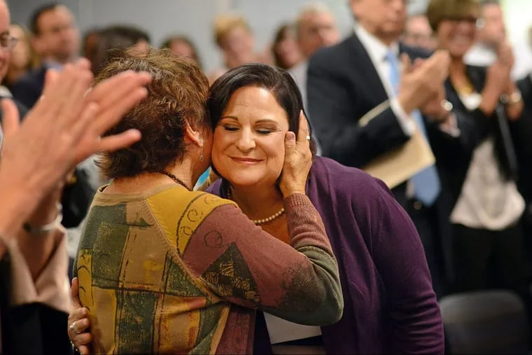 Teacher Amy Andersen (right) is greeted by her mother, Ruth Brown (left), after she was announced as the New Jersey Teacher of the Year Wednesday, Oct. 04, 2017, at the New Jersey Department of Education in Trenton.